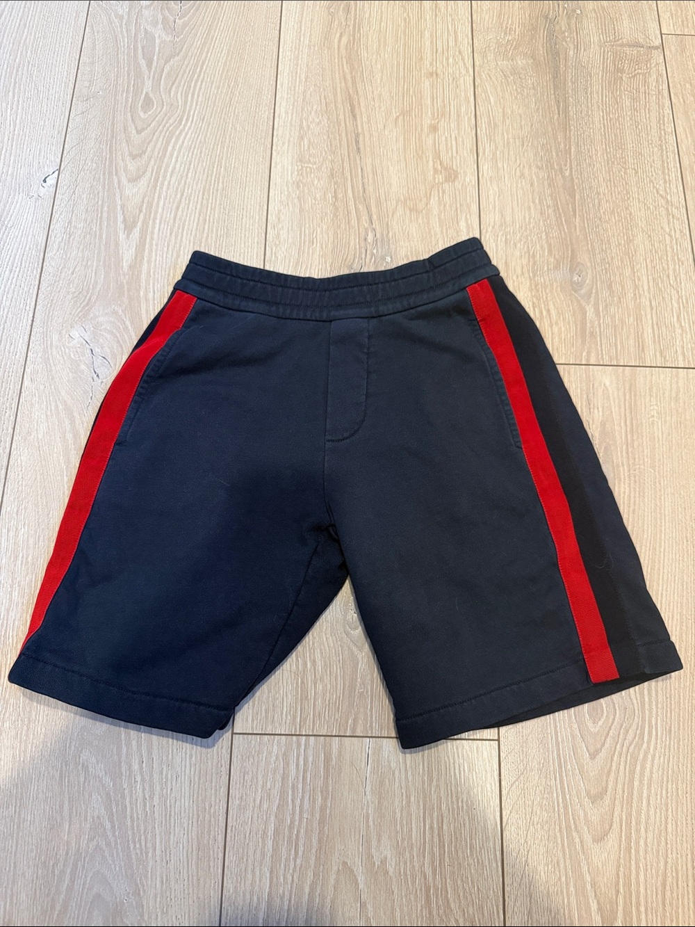 Moncler Navy Boys Athletic Shorts with Red Side Stripes